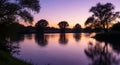 serene river landscape at twilight with tree silhouettes and vibrant sky reflections creating a tranquil and picturesque scene Royalty Free Stock Photo