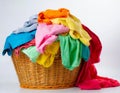 An image capturing an overflowing basket dedicated to laundry, symbolizing a common household task, set against a white background