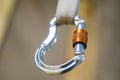 Image of a carabiner hook with climbing rope Royalty Free Stock Photo