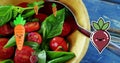 Image of carrot and beetroot icons falling over bowl of fruit salad on blue wooden table Royalty Free Stock Photo