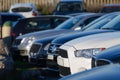 Cars in a parking lot in a row close up Royalty Free Stock Photo