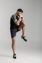 Image of caucasian athletic man doing exercise while working out