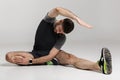 Image of caucasian athletic man doing exercise while working out