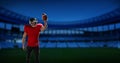 Image of caucasian male american football player with ball over stadium Royalty Free Stock Photo