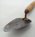 image of a cement spoon made of iron, used dirty and a little rusty