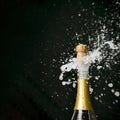 a champagne cork is popping out Royalty Free Stock Photo