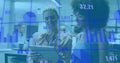 Image of changing numbers, graphs, diverse female coworkers discussing reports on digital tablet Royalty Free Stock Photo