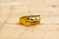 image of cheap used ring bijouterie on wood background