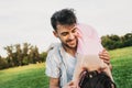 Image of cheerful handsome dad have fun together with his daughter. Happy cute little girl playing with father in the park. Father Royalty Free Stock Photo