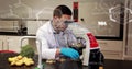 Image of chemical formula and data processing over caucasian male scientist working in lab Royalty Free Stock Photo