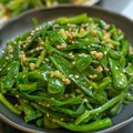 Image of Chinese food that of Stir-Fried Snow Pea Shoots Royalty Free Stock Photo