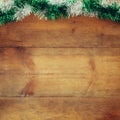 Image of christmas festive decoration on wooden background. retro filtered Royalty Free Stock Photo