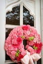 An image of church doors with Wedding flowers on i Royalty Free Stock Photo