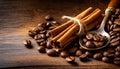 cinnamon sticks coffee beans and spoon on wooden table closeup macro shot , copy space for text Royalty Free Stock Photo