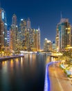 Dubai Marina night scene with glowing skyline and calm water reflections Royalty Free Stock Photo