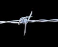 barbed wire on the black background Royalty Free Stock Photo