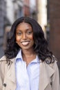 Radiant Smile of a Young African Woman in the City