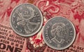 Image is a close-up view of a Canadian cent coins featuring the image of Majesty Queen Elizabeth II