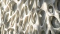 The image is a close up of a white sculpture with many holes in it Royalty Free Stock Photo
