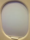 Image of closed airplane window.