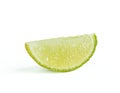 An image closeup isolated one lime or lemon ripe slice green color sour taste for cooking or beverage is food or fruit from nature