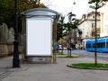 Image collage of bus shelter and white poster ad display glass