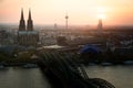 Image of Cologne with Cologne Cathedral with Rhine river and Hohenzollern bridge during sunset time in Germany. Royalty Free Stock Photo