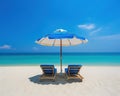 The color beach beds umbrella is on the ocean shore in the summer.