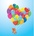 Image with colorful balloons in heart shape and teddy bear Royalty Free Stock Photo