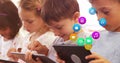 Image of colorful icons over diverse schoolchildren using tablets Royalty Free Stock Photo