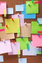 Image of colorful sticky notes on cork bulletin board Royalty Free Stock Photo