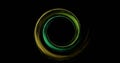 Image of colourful light trails forming circles on black background Royalty Free Stock Photo