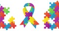 Image of colourful puzzle pieces autism awareness month ribbon