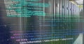Image of computer code and mathematical formulas over server racks in data center Royalty Free Stock Photo