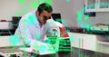 Image of computer language and molecule structure over biracial scientist using microscope Royalty Free Stock Photo