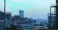 Image of computer language over modern buildings in background Royalty Free Stock Photo