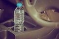 Image concept Bottled water was left in the car for a long time. To drink it? .