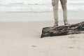 Image concept of leisure, recreation and well being.cropped image of lonely man standing on beautiful exotic beach