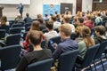 Image of a conference that takes place in a large conference room, workshop for young professionals, training in a large conferenc