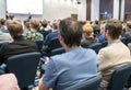 Image of a conference that takes place in a large conference room, workshop for young professionals, training in a large conferenc