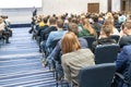 Image of a conference that takes place in a large conference room, workshop for young professionals, training in a large conferenc