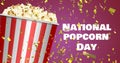 Image of confetti and national popcorn day text over box of popcorn Royalty Free Stock Photo