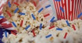 Image of confetti over boxes of popcorn Royalty Free Stock Photo