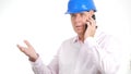 Image with a Confident Engineer Talking to Mobile and Gesticulating Upset Royalty Free Stock Photo