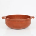 Image of a cooking clay pot on a white background Royalty Free Stock Photo