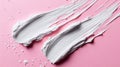 Image of cosmetic cream bits on a pink backdrop Royalty Free Stock Photo