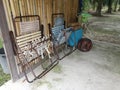 Couple of folded old lazy chair at the wooden shed. Royalty Free Stock Photo