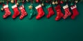 hanging red christmas stockings filled with gifts, copyspace, green background. ai generative Royalty Free Stock Photo