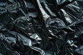 Image of Crumpled sheet of black polythene plastic wrap. Texture for background usage Royalty Free Stock Photo