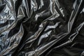 Image of Crumpled sheet of black polythene plastic wrap. Texture for background usage Royalty Free Stock Photo